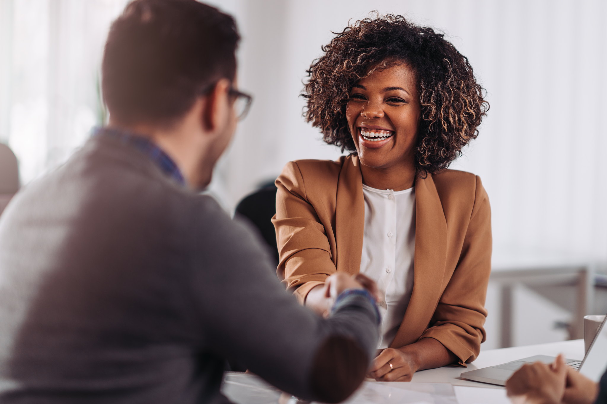 Reviewing a supplemental benefits plan at a desk